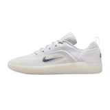 White sneaker with a Nike logo on a light gray background
