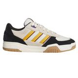 Sneaker with black, white, yellow, and brown design on a white background